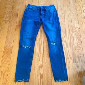 Selling skinny ripped jeans